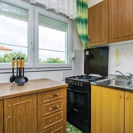 Apartment With A Parking Space Barbat, Rab - 22498 *
